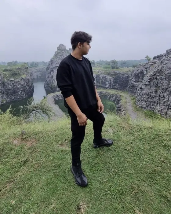 Abhijay above a quarry lake